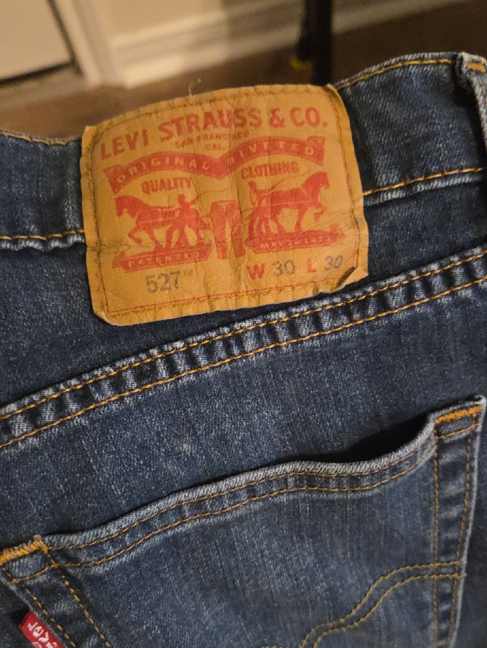 Levi's Blue Denim Jeans with Tan Patch